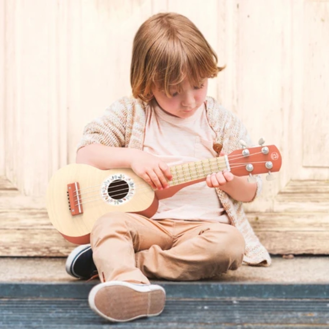 Speedy Monkey Ukulele Giocattolo in Legno Terracotta