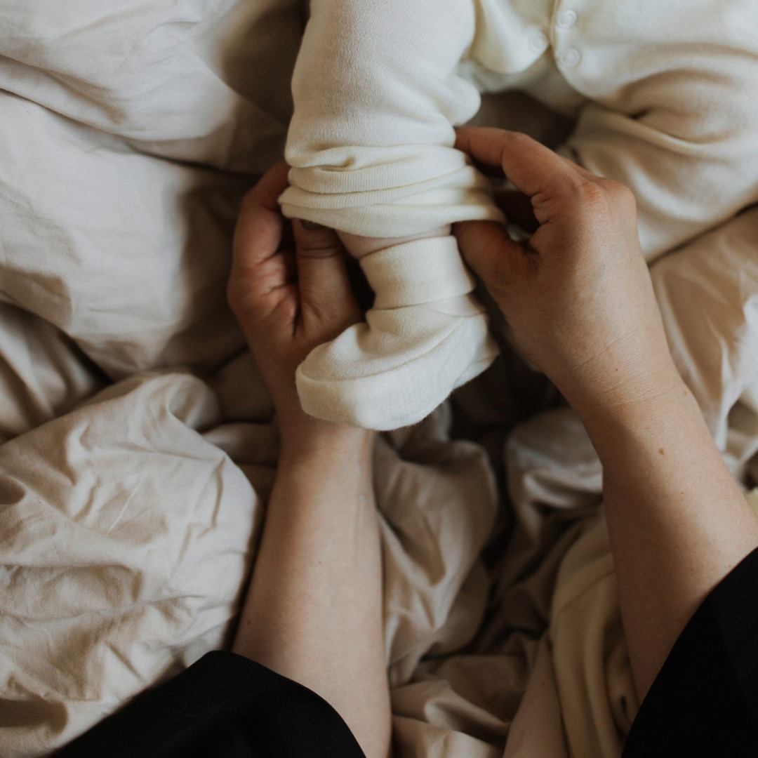 Wooly Organic scarpine neonato in lana merinos