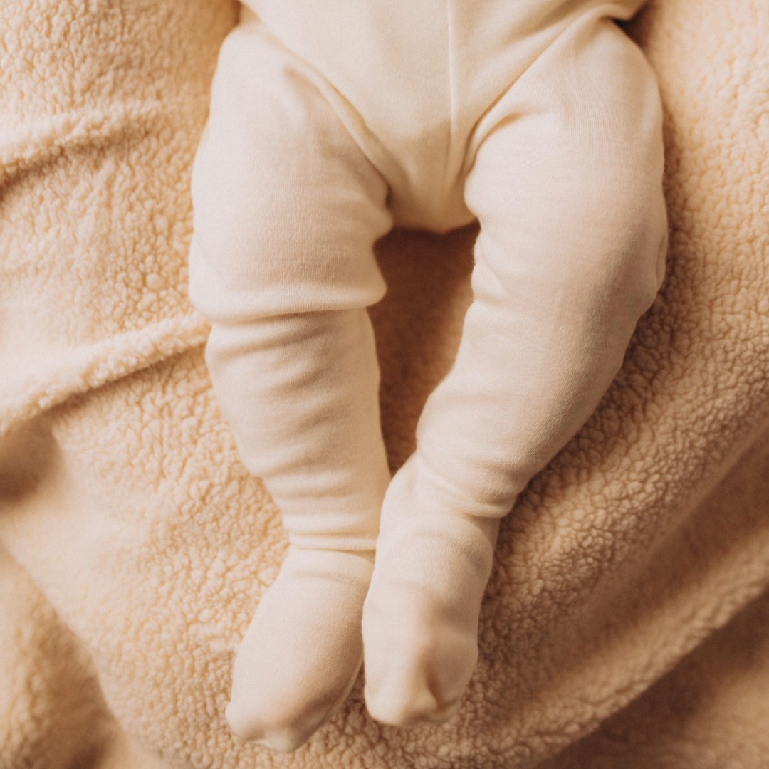 Wooly Organic Baby Leggings con piedini merino
